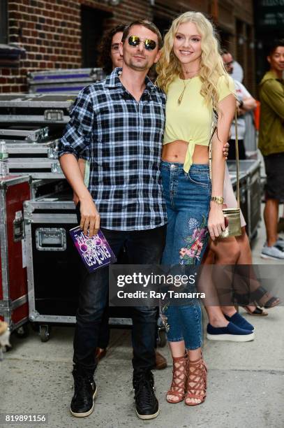 Musician Matt Bellamy and model Elle Evans enter the "The Late Show With Stephen Colbert" taping at the Ed Sullivan Theater on July 20, 2017 in New...