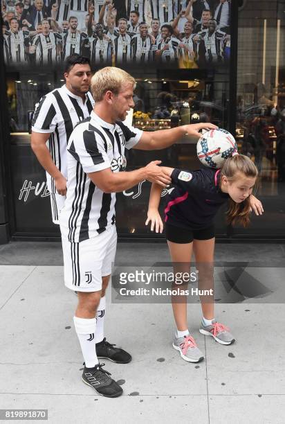 New York Red Bulls players and a fan attend an event hosted by Hublot to welcome the Juventus Football Club to NYC on July 20, 2017 in New York City.