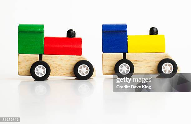 two toy train engines - locomotive side view stock pictures, royalty-free photos & images