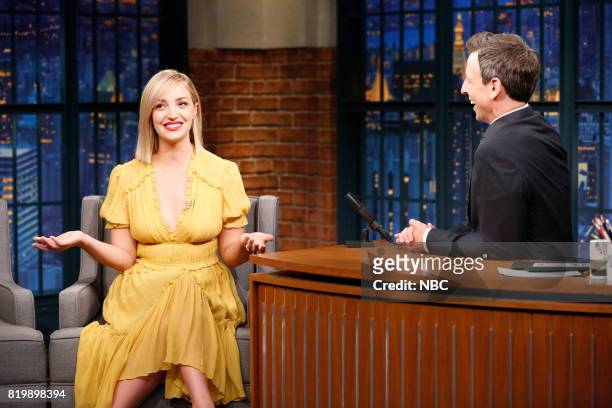 Episode 554 -- Pictured: Actress Abby Elliott talks with host Seth Meyers during an interview on July 19, 2017 --