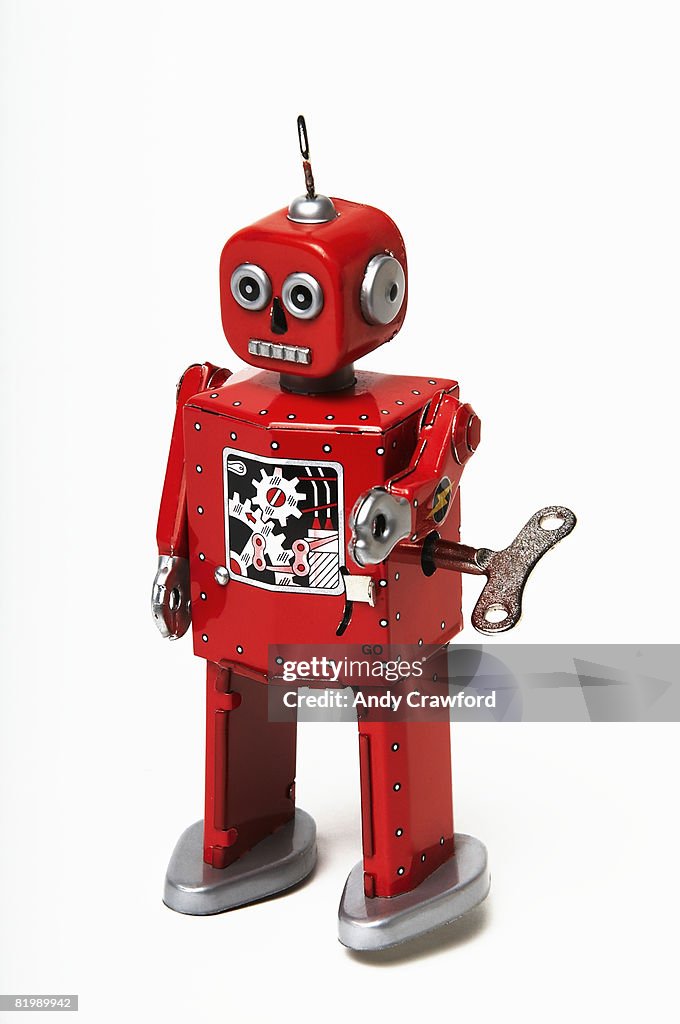 Red tin wind-up robot toy