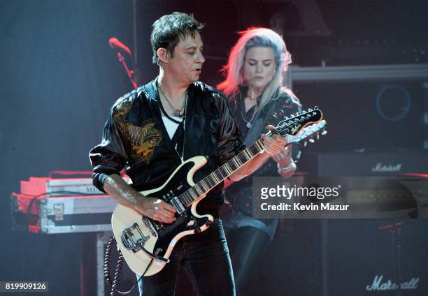 Jamie Hince and Alison Mosshart of The Kills perform onstage during SiriusXM's Private Show with Guns N' Roses at The Apollo Theater before band...