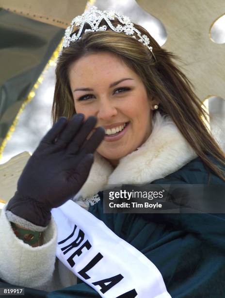 Ireland's representative for the Miss Universe Pageant Lesley Turner waves from her float March 17, 2001 during Chicago's St. Patrick's Day Parade.