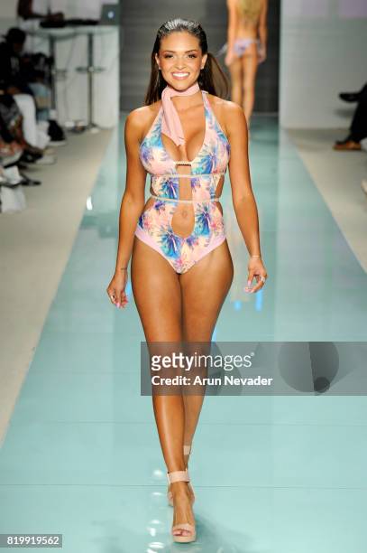 Model walks the runway during Best Talent Group Presents VICHI At Miami Swim Week Art Hearts Fashion at FUNKSHION Tent on July 20, 2017 in Miami,...