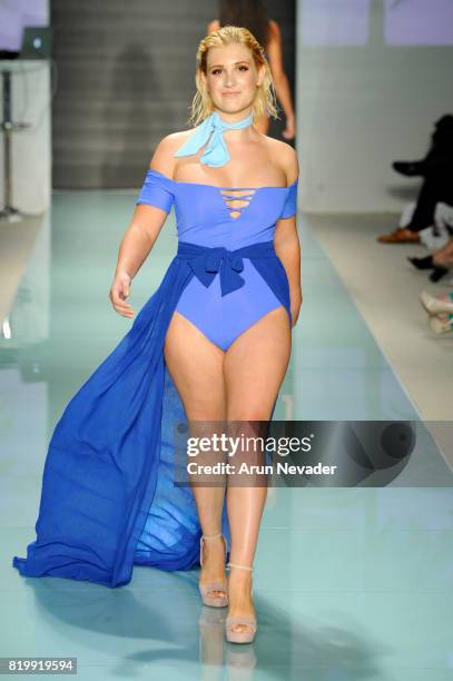 Model walks the runway during Best Talent Group Presents VICHI At Miami Swim Week Art Hearts Fashion at FUNKSHION Tent on July 20, 2017 in Miami,...