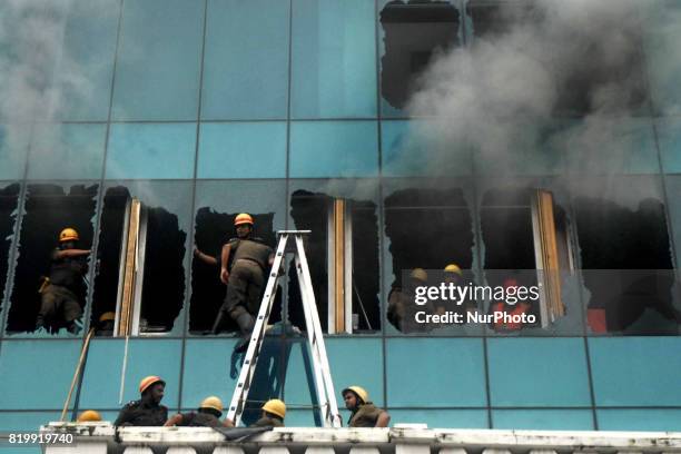 Multi-storied building in Central Kolkata, which houses a number of offices, caught fire this afternoon. Some of the glass panes had to be broken for...