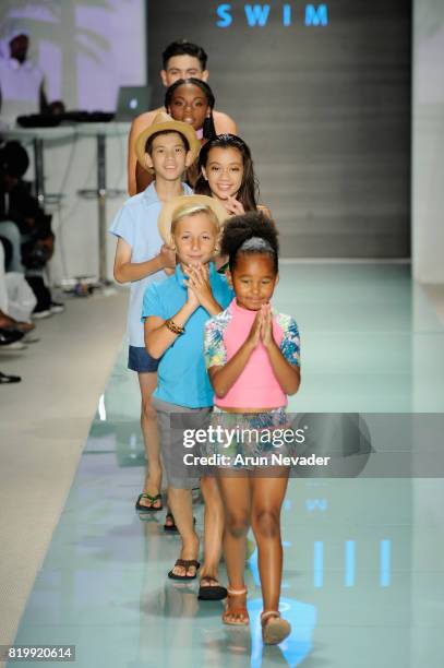 Model walks the runway during Best Talent Group Presents VICHI At Miami Swim Week Art Hearts Fashion at FUNKSHION Tent on July 20, 2017 in Miami,...