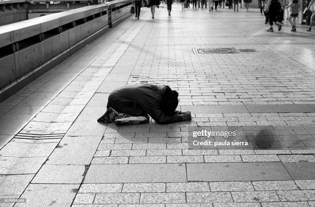 Begging Def Begging High-Res Stock Photo - Getty Images