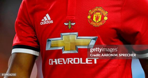 Detail view of bee is seen on a Manchester United jersey during the International Champions Cup soccer match against Manchester City at NRG Stadium...