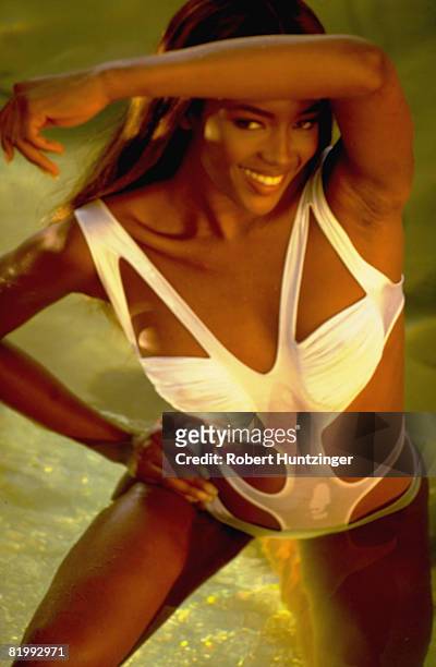 Swimsuit Issue 1992: Model Naomi Campbell poses for 1992 Sports Illustrated Swimsuit issue on November 1, 1991 on Cadaques Island in Girona, Spain....