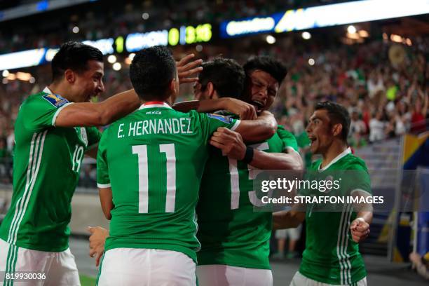 Rodolfo Pizarro celebrates after scoring the opening goal during the CONCACAF Gold Cup 2017 quarterfinal match between Mexico and Honduras at...