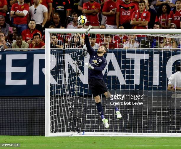 Manchester United goalkeeper David De Gea makes a save against Manchester City in the first half at NRG Stadium on July 20, 2017 in Houston, Texas.