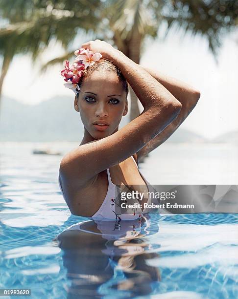 Swimsuit Issue 2000: Model Noémie Lenoir poses for the 2000 Sports Illustrated Swimsuit issue on August 20, 1999 in Malaysia. CREDIT MUST READ:...