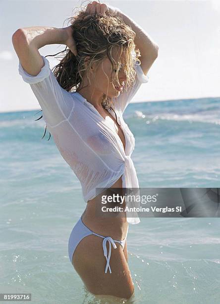 Swimsuit Issue 1999: Model Rebecca Romijn poses for the 1999 Sports Illustrated swimsuit issue on February 1, 1999 on Necker Island. CREDIT MUST...