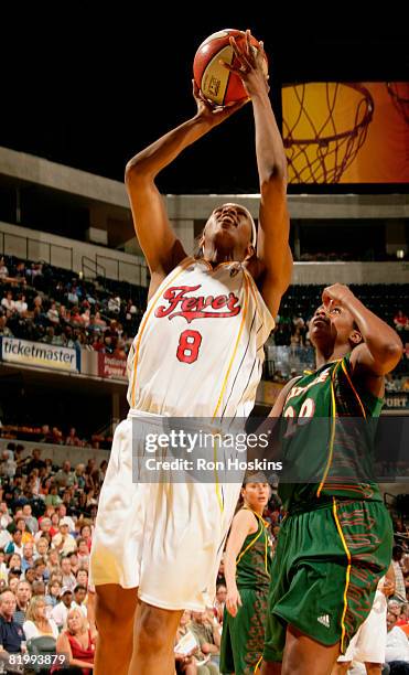 Tammy Sutton-Brown of the Indiana Fever shoots over Camille Little of the Seattle Storm at Conseco Fieldhouse on July 18, 2008 in Indianapolis,...