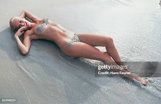 Swimsuit Issue 1999: Model Sarah O'Hare is photographed for the 1999 Sports Illustrated Swimsuit issue on February 1, 1999 in the British Virgin...