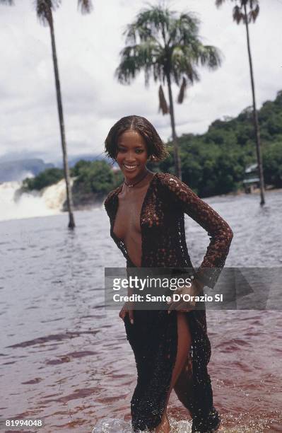 Swimsuit Issue 1997: Model Naomi Campbell poses for the 1997 Sports Illustrated Swimsuit issue on October 17, 1996 in Ciudad Bolivar, Venezuela....