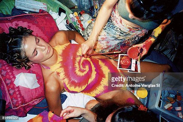 Swimsuit Issue 1999: Model Heidi Klum poses for the 1999 Sports Illustrated swimsuit issue on February 1, 1999 on Necker Island. Body painting by...