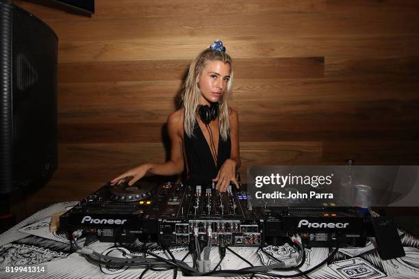 Sam Black DJs at Bollare x The Cobrasnake Miami Swim Week Opening Party At The Miami Beach Edition Basement on July 20, 2017 in Miami Beach, Florida.