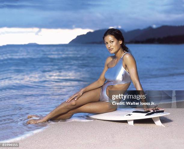 Swimsuit Issue 2000: Surfer/model Malia Jones poses for the 2000 Sports Illustrated swimsuit issue on November 7, 1999 on Oahu, Hawaii. CREDIT MUST...