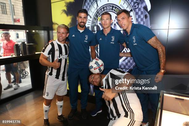 Sami Khedira, Stephan Lichtsteiner, and Mario Mandzukic pose with New York Red Bulls players DJ Bivery and Victor Miranda as Hublot Welcomes Juventus...