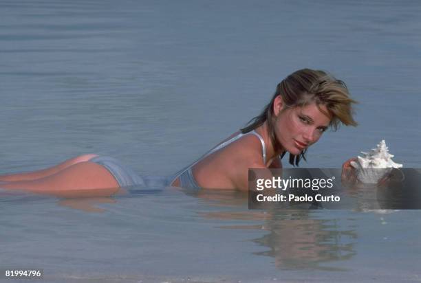 Swimsuit Issue 1984: Model Kelly Emberg poses for the 1984 Sports Illustrated Swimsuit issue on December 16, 1983 on Bonaire. PUBLISHED IMAGE. CREDIT...