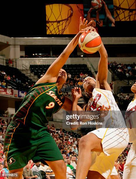 Kelly Santos of the Seattle Storm battles Tammy Sutton-Brown of the Indiana Fever at Conseco Fieldhouse on July 18, 2008 in Indianapolis, Indiana....