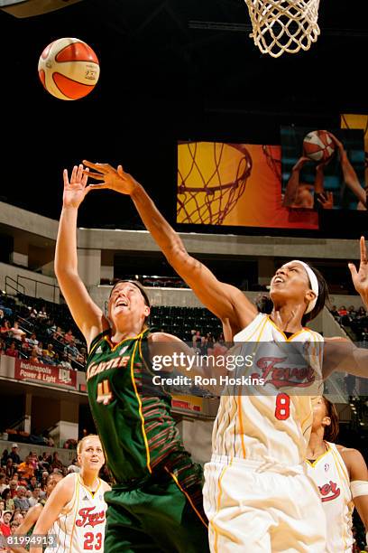 Katie Gearlds of the Seattle Storm shoots over Tammy Sutton-Brown of the Indiana Fever at Conseco Fieldhouse on July 18, 2008 in Indianapolis,...