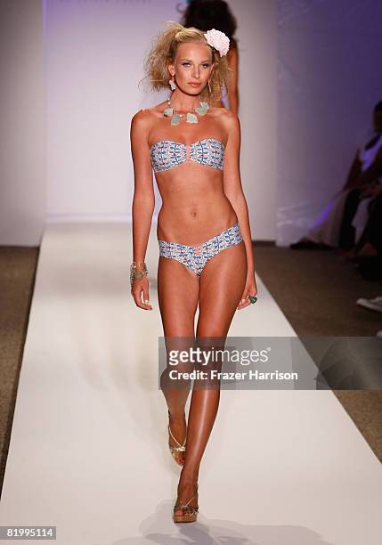 Model walks the runway at Syla by Sylvie Cachay 2009 collection fashion show during Mercedes-Benz Fashion Week Swim at the Raleigh Hotel on July 18,...