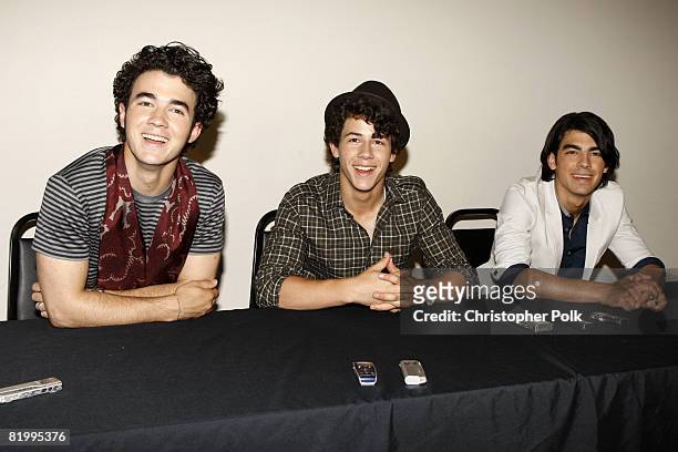 Kevin Jonas, Nick Jonas and Joe Jonas of The Jonas Brothers during a press conference before the live taping of MTV's "FNMTV" on July 18, 2008 in...