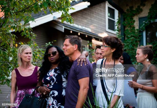 Valerie Castile, the mother of Philando Castile, embraces Don Damond, the fiance of Justine Damond, outside his home on July 20, 2017 in Minneapolis,...
