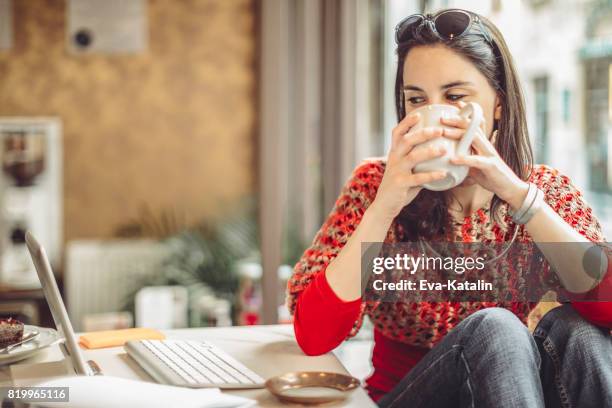 coffee break - hipster coffee shop candid stock pictures, royalty-free photos & images