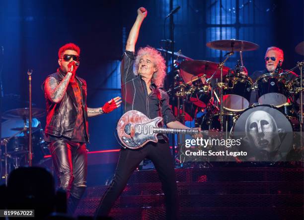 Adam Lambert, Brian May and Roger Taylor of Queen perform at The Palace of Auburn Hills on July 20, 2017 in Auburn Hills, Michigan.