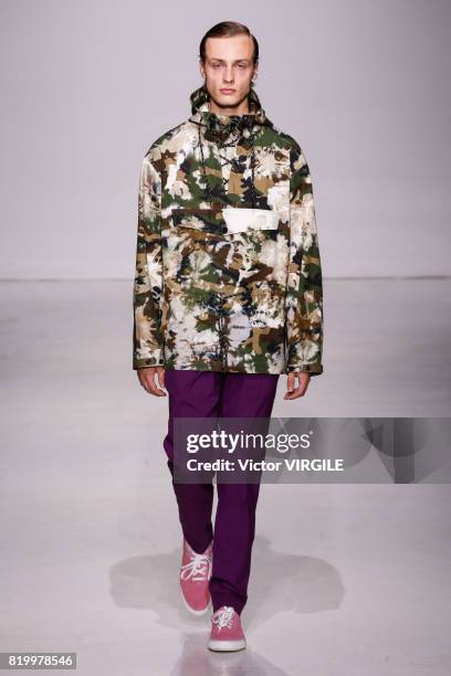 Model walks the runway at the Ovadia & Sons during the NYFW: Men's July 2017 Spring Summer 2018 Collection at Skylight Clarkson Sq on July 12, 2017...