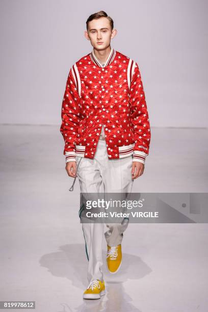 Model walks the runway at the Ovadia & Sons during the NYFW: Men's July 2017 Spring Summer 2018 Collection at Skylight Clarkson Sq on July 12, 2017...