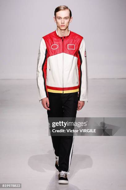 Model walks the runway at the Ovadia & Sons during the NYFW: Men's July 2017 Spring Summer 2018 Collection at Skylight Clarkson Sq on July 12, 2017...