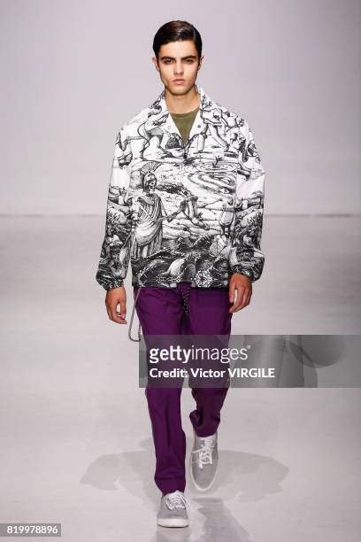 Model walks the runway at the Ovadia & Sons during the NYFW: Men's July 2017 Spring Summer 2018 Collection at Skylight Clarkson Sq on July 12, 2017...