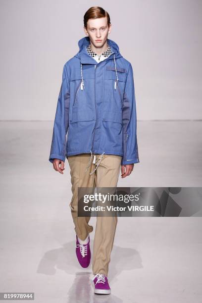 Model walks the runway at the Ovadia & Sons during the NYFW: Men's July 2017 Spring Summer 2018 Collection at Skylight Clarkson Sq on July 12, 2017...