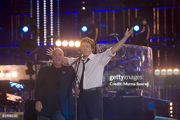 Billy Joel and Sir Paul McCartney perform during the Billy Joel "Last Play At Shea" concert at the Shea Stadium on July 18, 2008 in New York City.