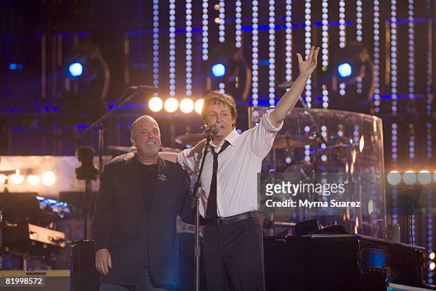 Billy Joel and Sir Paul McCartney perform during the Billy Joel "Last Play At Shea" concert at the Shea Stadium on July 18, 2008 in New York City.