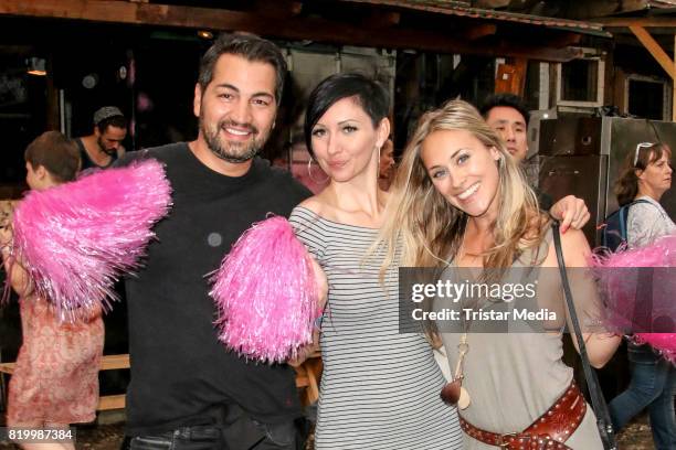 Actor Buelent Sharif, Sandra Sperling and actress Sina Tkotsch during the celebration of the Friedrichstadt-Palast Christopher Street Day at Mercedes...