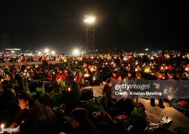 Pilgrims camp out under the stars ahead of the evening vigil, consisting of music and song, a ceremony of candlelight and a representation of the 10...