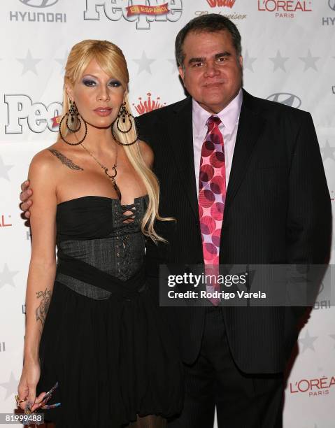 Ivy Queen and Armando Correa poses during arrivals at the People en Espanol Star Of The Year celebration on December 12, 2007 in Miami, Florida.