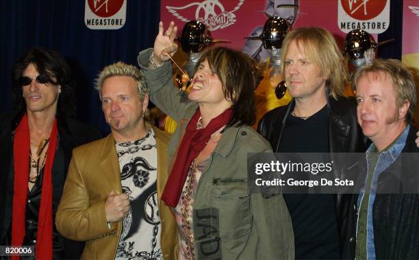 Left to right, guitarist Joe Perry, drummmer Joey Krammer, vocalist Steven Tyler, bassist Tom Hamilton and guitarist Brad Whitford of the rock group...