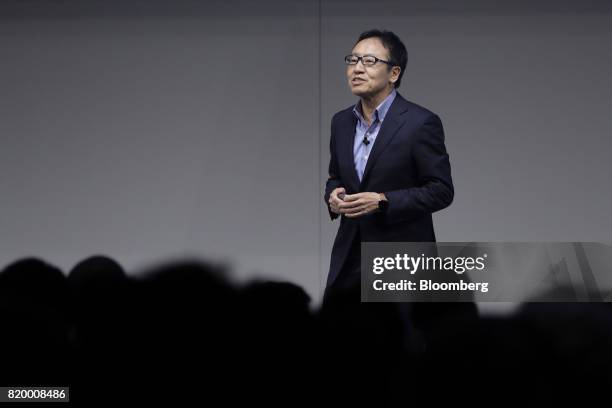 Ken Miyauchi, president and chief executive officer of SoftBank Corp., speaks at the SoftBank World 2017 event in Tokyo, Japan, on Friday, July 21,...