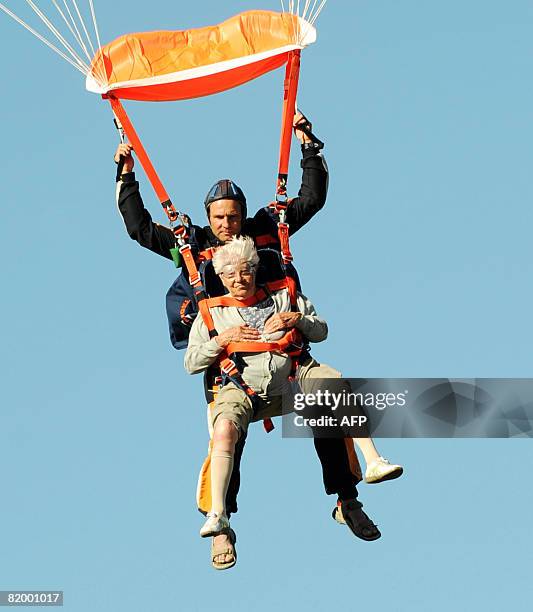 Alice Delfine performs a 2500 m freefall parachute jump with her skydiver instructor on July 19, 2008 at Gap-Tallard aerodrome, southern France. AFP...