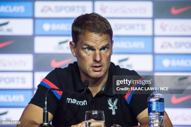 Crystal Palace manager Frank de Boer speaks during a press conference of the Premier League Asia Trophy football tournament in Hong Kong on July 21,...