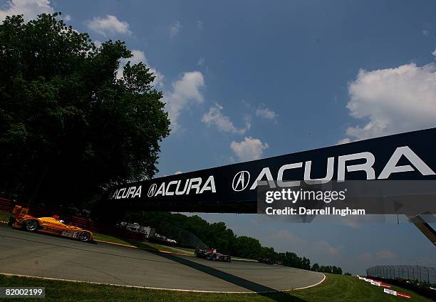 The Penske Racing Porsche RS Spyder driven by Timo Bernhard and Romain Dumas chase the field during the American Le Mans Series Acura Sports Car...