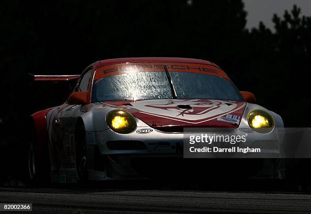The Flying Lizards Motorsports Porsche 911 GT3 RSR driven byJohannes van Overbeek during the American Le Mans Series Acura Sports Car Challenge on...