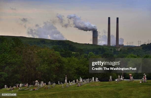 The Elderton Cemetery is in the foreground as The Keystone Generating Station looms in the distance. -A Washington Post-Kaiser Family Foundation...